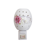 Lampă de veghe din ceramică, decorată cu floare albă și roz